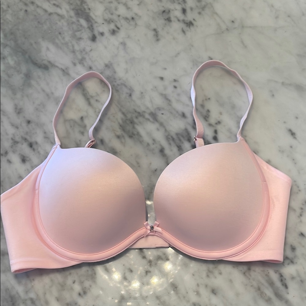 Victoria’s Secret light pink plunge bra 
Size: 32C